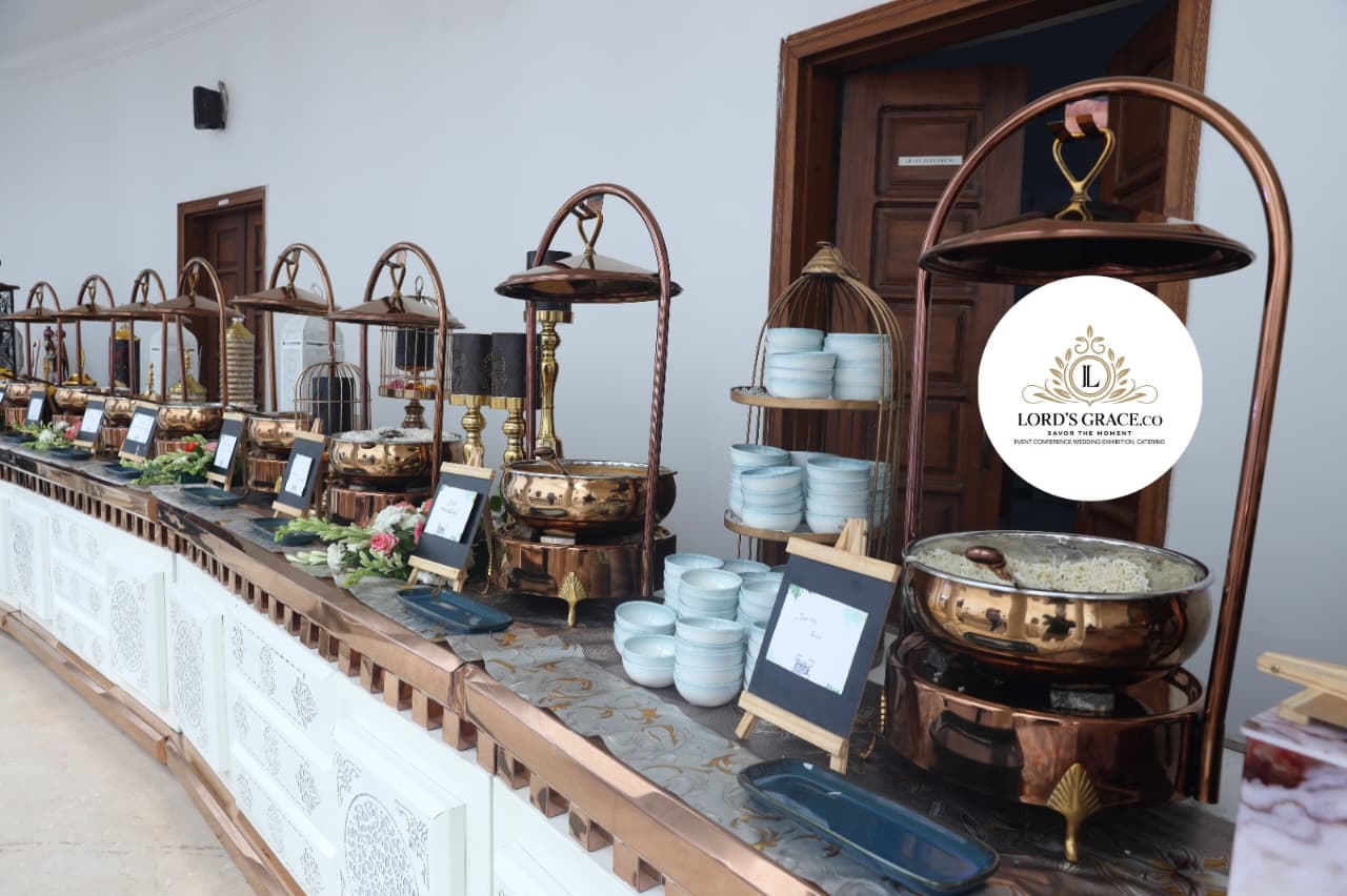 Gold buffet & live counters by Lord's Grace caterers